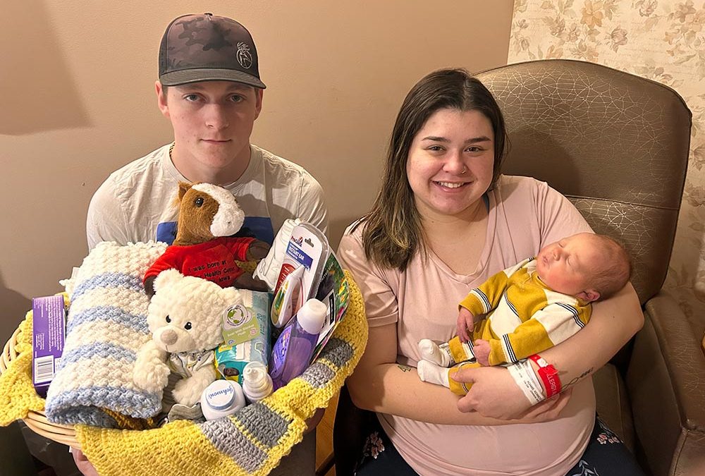 WHC's first baby of the new year, Suede Dean Faust, with parents Kennedy and Scott.