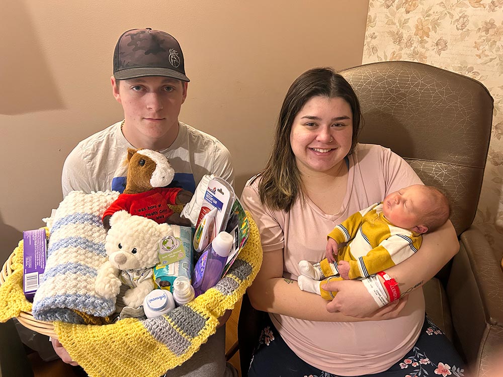WHC's first baby of the new year, Suede Dean Faust, with parents Kennedy and Scott.