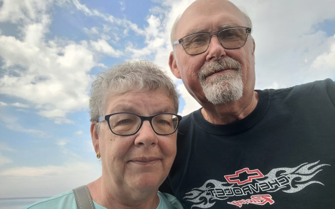 Cardiac rehab patient Kenny Eckhoff with his wife Sharon smiling together after his open-heart surgery recovery at Waverly Health Center.