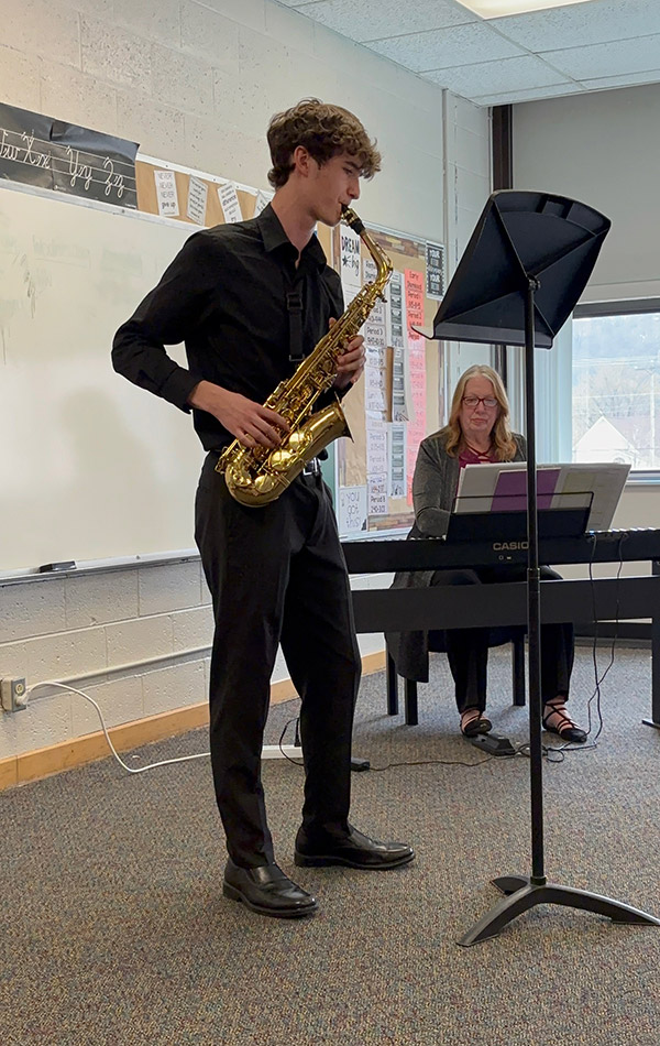 Lincoln playing saxophone